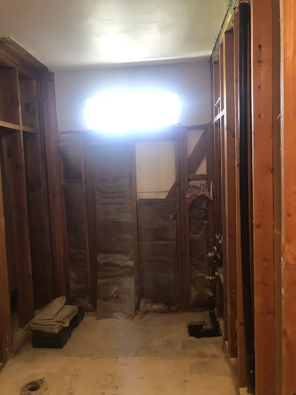 Drywall and framing repair in progress on a Kern County job